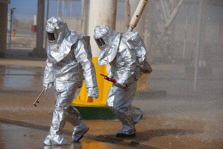 Oil workers protective clothing fighting photo