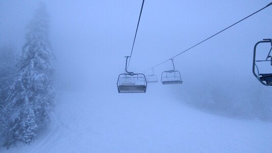 Fog snow slopes photo
