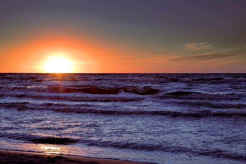 Golden glow the waves photo