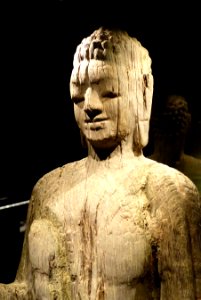 Buddha statue, 4th-6th century, view 2, wood - National Museum of Vietnamese History - National Museum of Vietnamese History - Hanoi, Vietnam - DSC05745