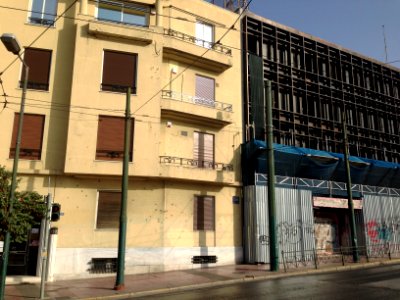 Building with bullet holes in Athens