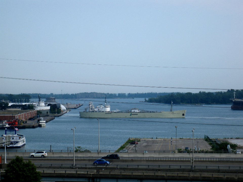 English River backs in to the Polson slip to moor at the La Farge cement silos -a