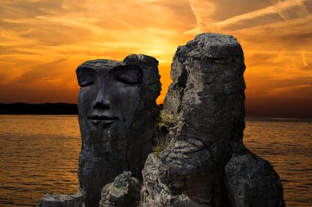 Stone face sunset dusk photo