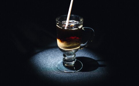 Cream straw black coffee photo