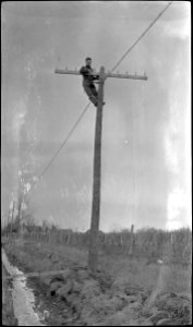 Bell Telephone, Winona, Ontario - employee standing at top… photo