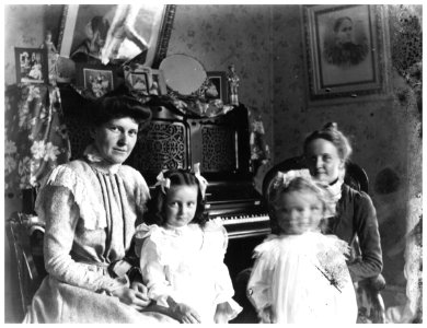 The Clows inside by their piano
