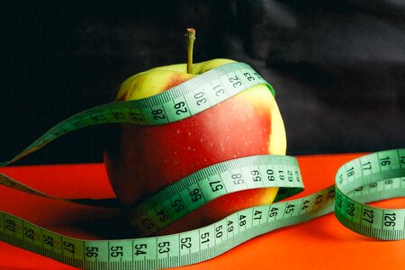 Healthy food measuring tape photo