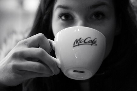 Woman drinking coffee photo