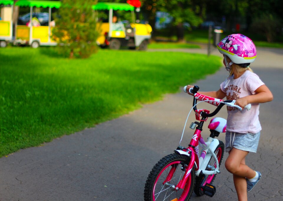 Girl on a bike young childhood