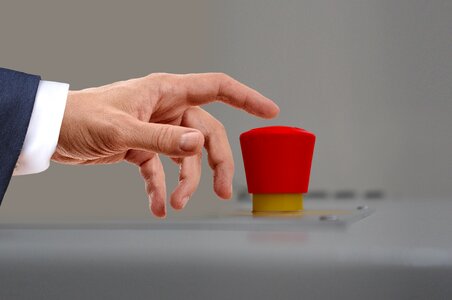 Button finger press photo