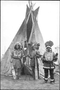 A trio of Indians of the Caughnawaga tribe with decorated…
