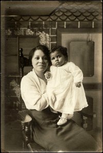 Woman holding a child photo