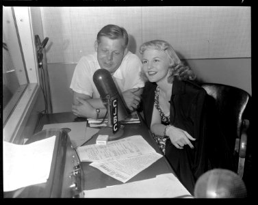 Byng Whittaker and Peggy Lee at a CJBC microphone photo