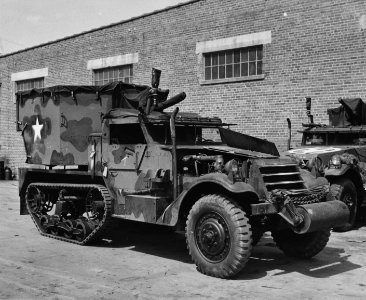 336-H-05-O2594 - Half-track camouflaged, with 37mm gun and…