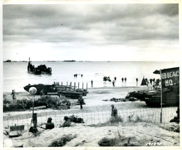 SC 190275 - Amphibious trucks bring in supplies, on Utah B… photo