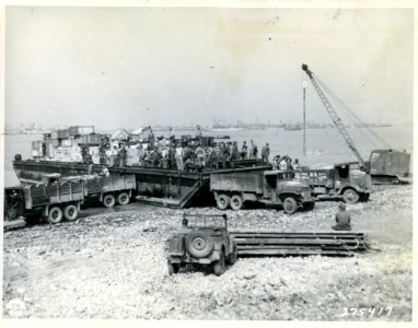 SC 275417 - Supplies are unloaded from the Dumb Barge on 6…