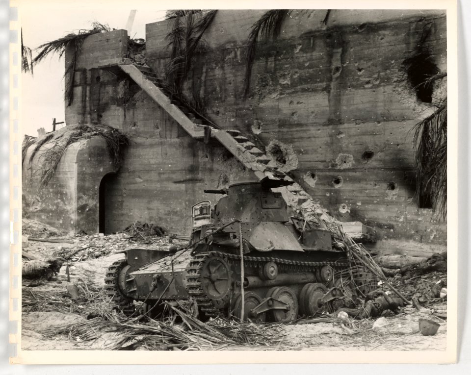 *Knocked-out Japanese tank next to Japanese command post o…