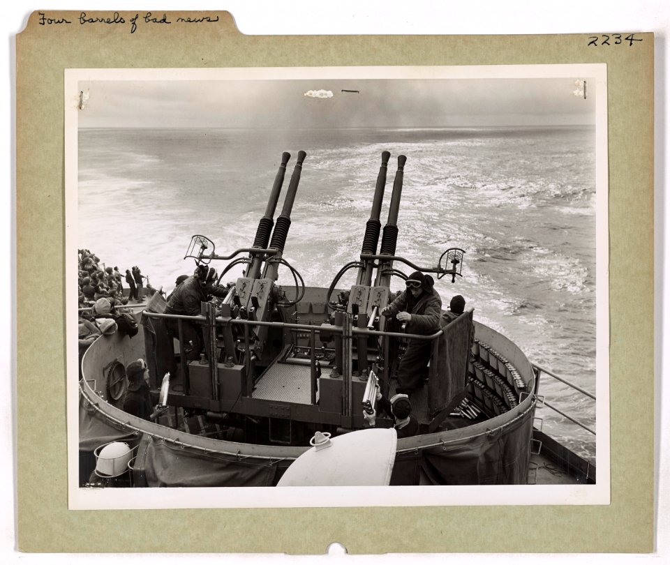 Aboard a Coast Guard-manned assault transport somewhere in…