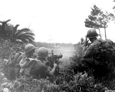 SC 205564 - Heavy machine guns of 96th Division fire on Ja… photo