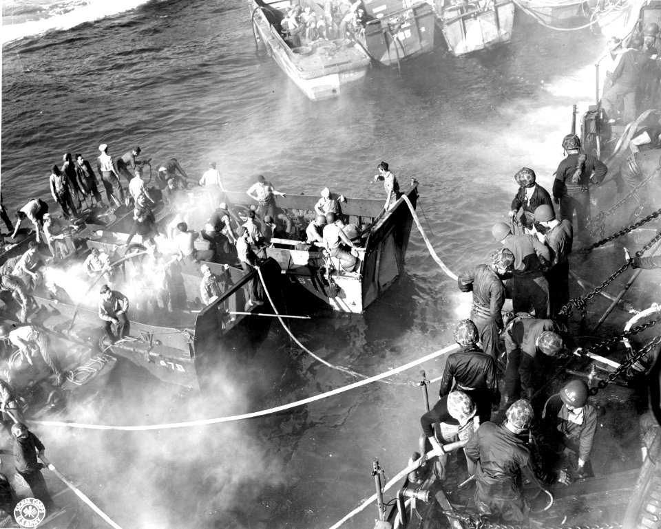 SC 207299 - A flotilla of small rescue boats gathers aroun…