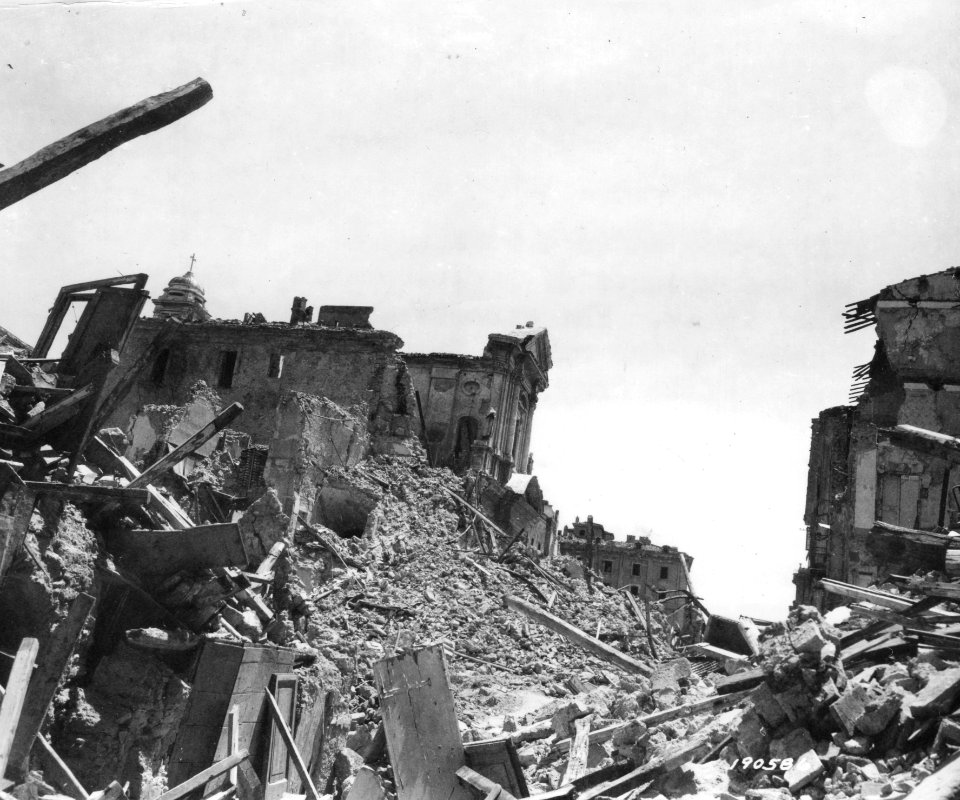SC 190586 - This photo shows the wreckage of buildings in …