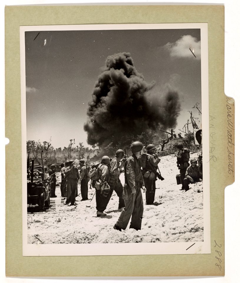 Close by a landing party of Coast Guard and Marine invader…