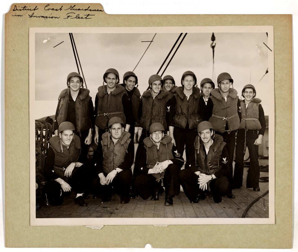 Veterans of other invasion operations, these Coast Guardsm…