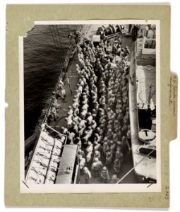 Army troops line up on the deck of a Coast Guard assault t… photo