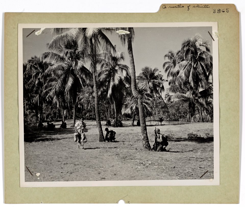 A Filipino woman scurries for cover in this unusual pictur…