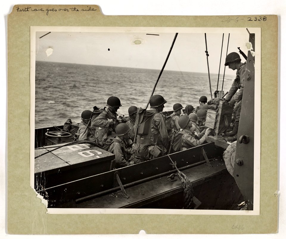 Bound for the liberation of Western Europe, Yankee soldier…