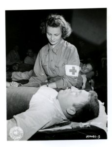 SC 191001-S - In a field hospital in Normandy, France, Lt.… photo