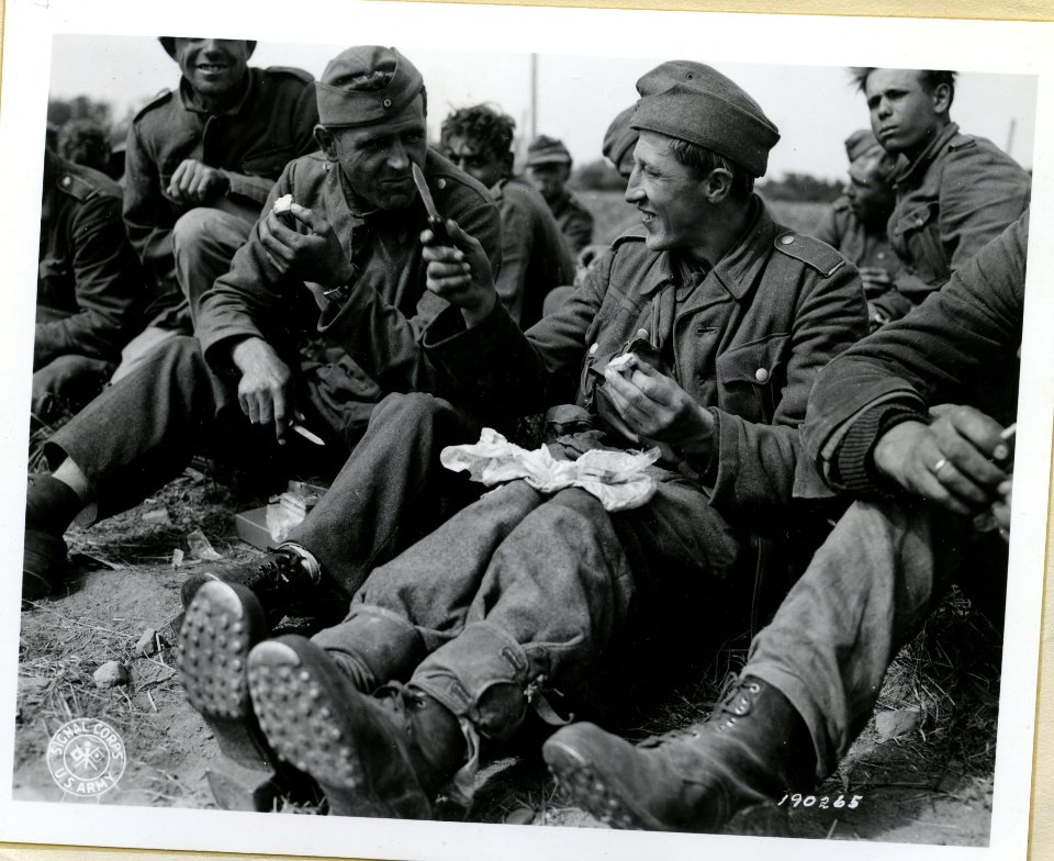 SC 190265 - Grinning broadly, captured German soldiers on …