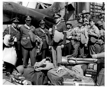 336-H-07-L4611 - Noted war correspondents and newsreel men…