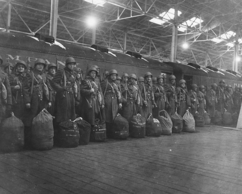 336-H-02-L387 - Troops lined up on Pier 4 before boarding …
