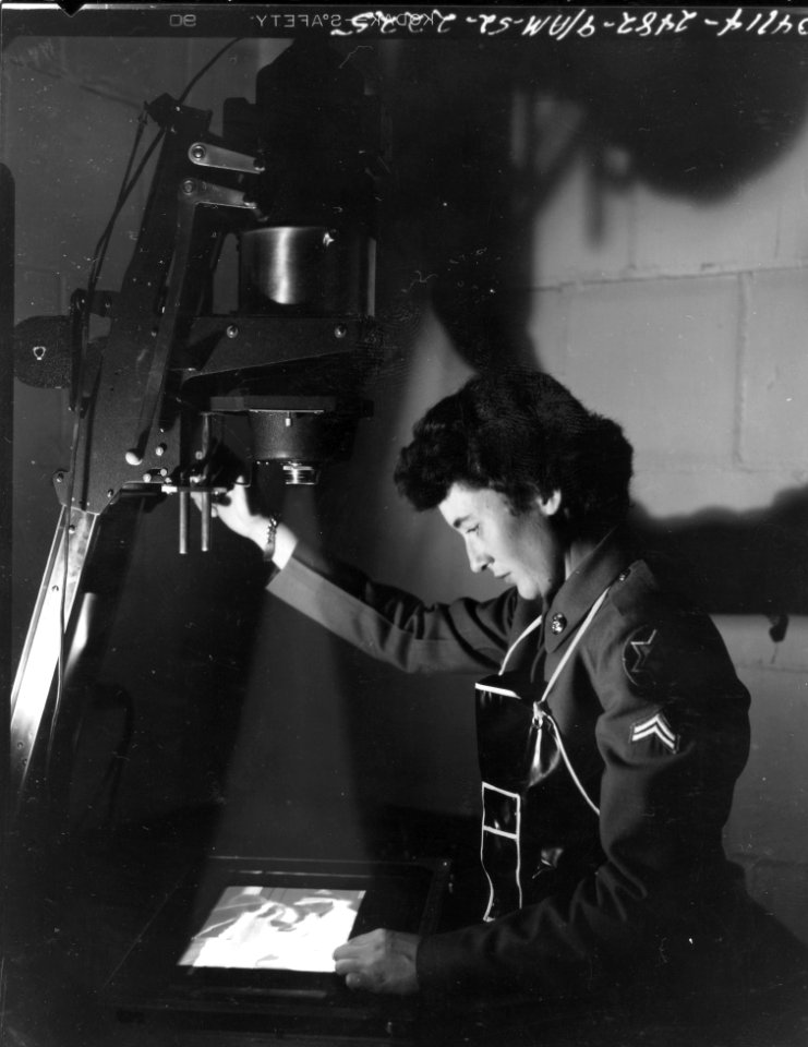 SC 411548 - Cpl. Joan Mansfield is assigned as a photograp…