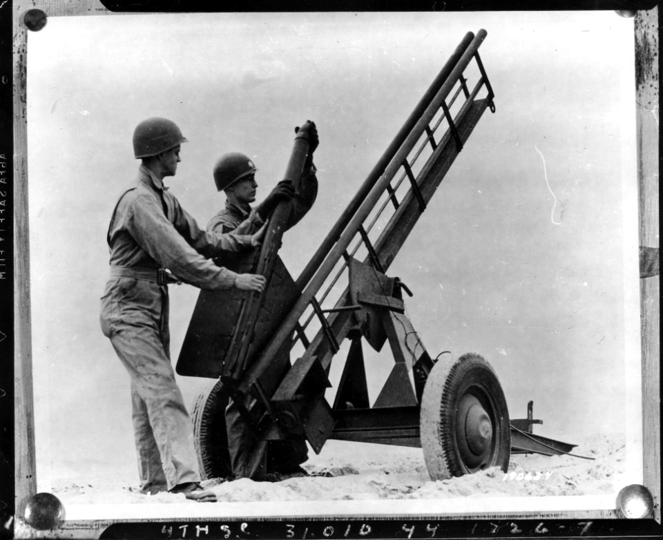 SC 190634 - Mounting of rocket on rocket launcher. Camp Da…