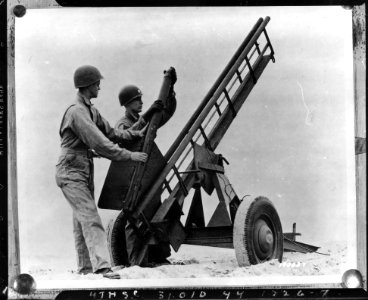SC 190634 - Mounting of rocket on rocket launcher. Camp Da…