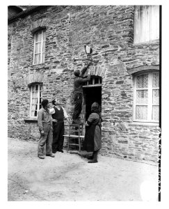 SC 190612 - French civilians hang the flag of their libera… photo