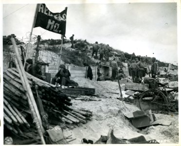 SC 190263 - A command post on Utah Beach, showing men and … photo