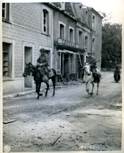 SC 190123-S - Finding horses plentiful in St. Mere Eglise,… photo