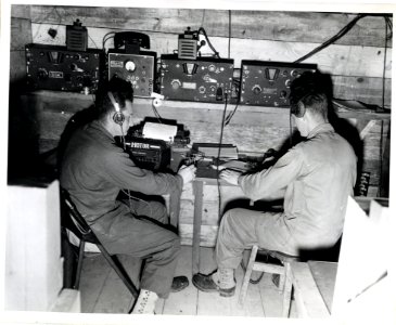 SC 392800 - Inside of radio shack, set up in foxhole. L to…