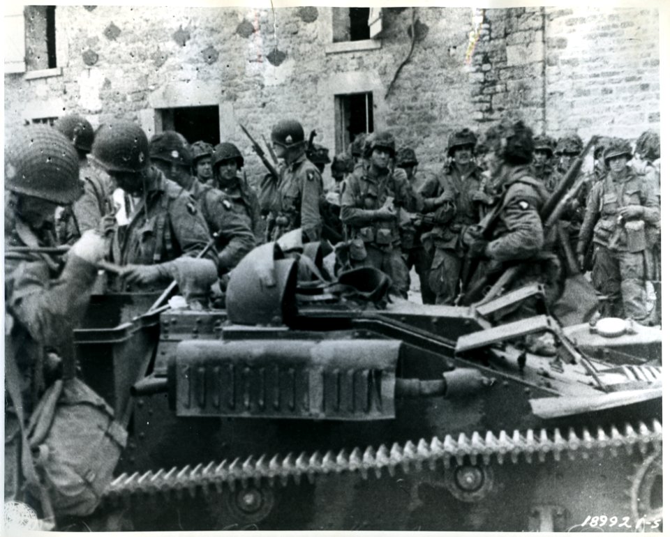 SC 189921-S - A group of American paratroopers in a French…