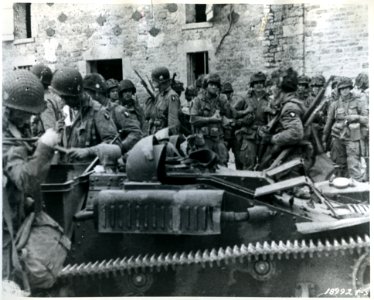 SC 189921-S - A group of American paratroopers in a French…