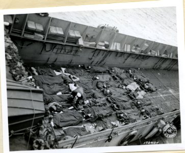 SC 190404 - Casualties crowd the floor of an amphibious cr… photo