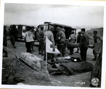 SC 190369 - Army medical corps men unload wounded German p… photo