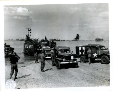 SC 191168 - This Rhino ferry unloads its cargo of Army amb…