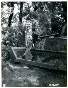 SC 192280 - This U.S. Army tank-dozer is shown ramming a h…