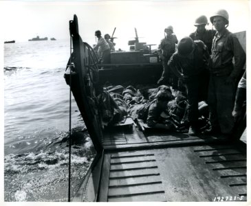 SC 192721-S - Evacuation of wounded on beach into Higgins … photo