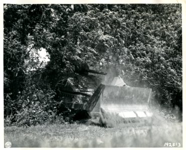 SC 192513 - This tank-dozer of an armored unit in Normandy…