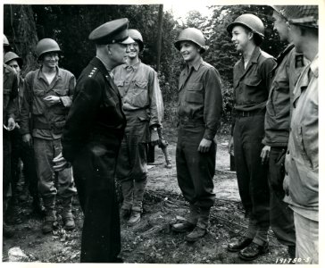 SC 191750-S - General Eisenhower pauses to talk to these G…